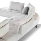 curvy L-shaped white leather sofa