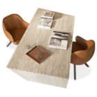 contemporary marble desk with two leather chairs next to it